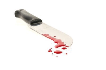Blood splatter with kitchen knifeの写真素材