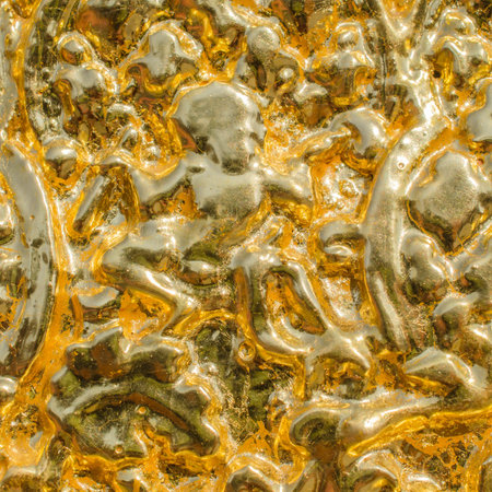 Gold metallic background, linen texture, bright festive backgroundの写真素材