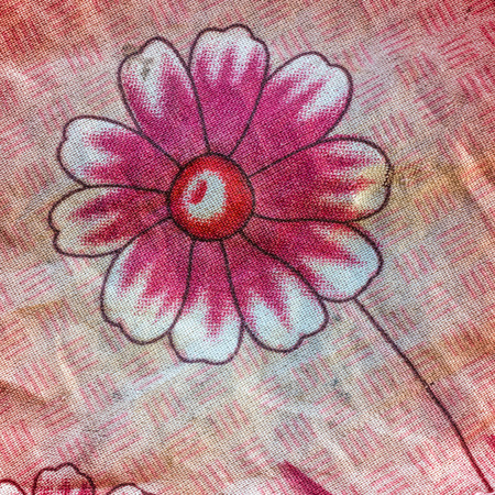 Fragment of colorful retro tapestry textile pattern with floral ornamentの写真素材