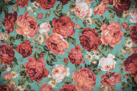 Fragment of colorful retro tapestry text, Fragment of colorful retro tapestry textile pattern with floral ornament useful as backgroundの写真素材