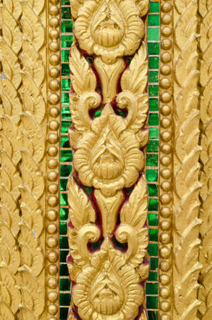 Some of the stucco pattern Thailand gold on a red background, Public areaの写真素材