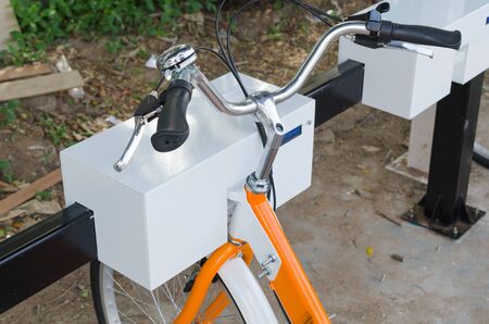 Chiang Mai 2015 public hire bike along with Barclays Bikes locked at the docking bays.の写真素材