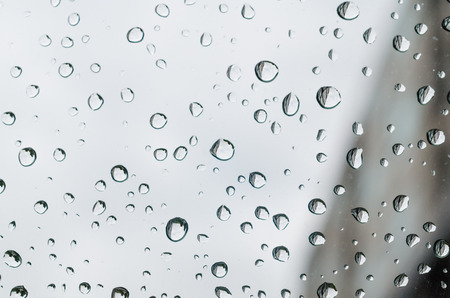 Water drop on glass - windshield rain.の写真素材