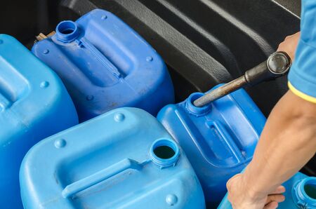 Storing oil in gallon plastic.の写真素材