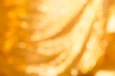 Gold spring or summer background. Elegant abstract background with bokeh defocused lights