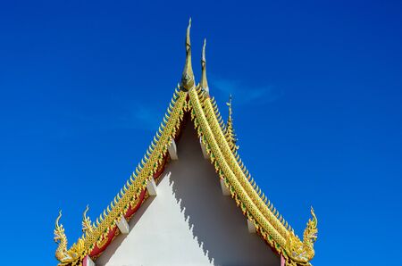 Gold color roof in Thai temple, Thailand.の写真素材