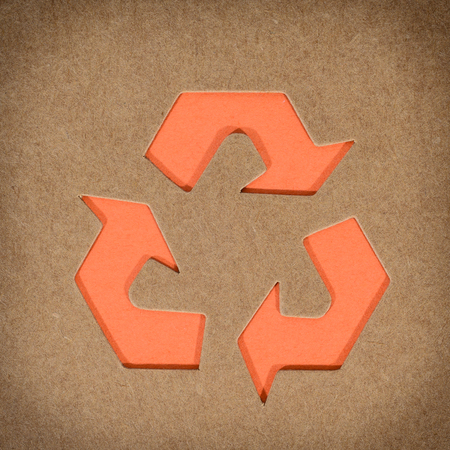 Cardboard box background with recycle symbolの写真素材