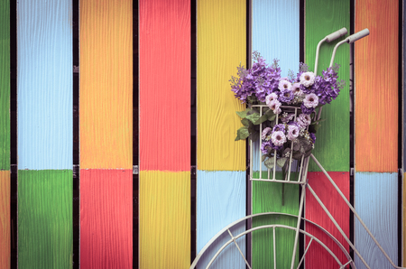 vintage bicycle on vintage wooden house wallの写真素材