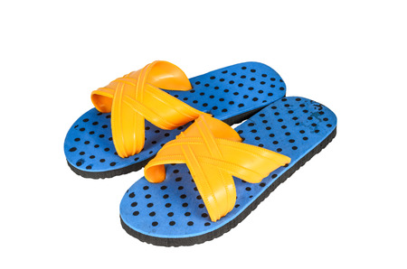 Blue flip flops with soft shadowの写真素材