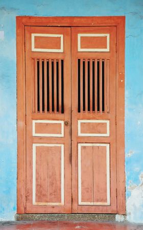 The Traditional Door on The Blue Wallの写真素材