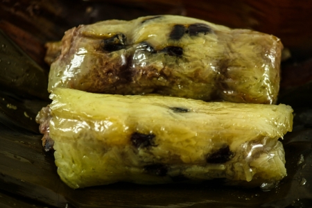 Thai style dessert, made from banana and glutinous rice, wrap with banana leafの写真素材