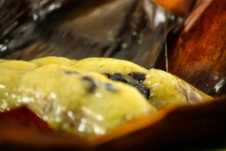 Thai style dessert, made from banana and glutinous rice, wrap with banana leafの写真素材