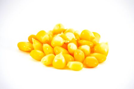 Fresh raw corn cob isolated on the whiteの写真素材