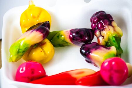 Thai various desserts are colour on white backgroundの写真素材