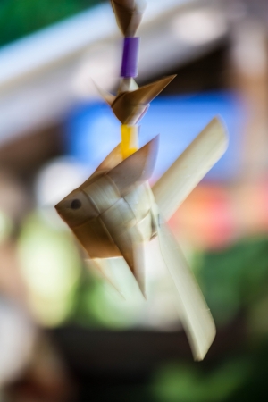 fishshaped ornaments made of palm leaf watermelonの写真素材