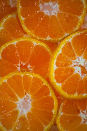 ripe orange with leaves on white backgroundの写真素材