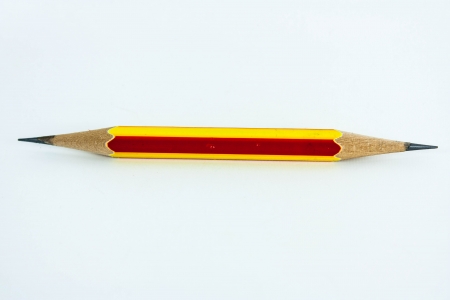 handle yellow red pencil lay on white backgroundの写真素材
