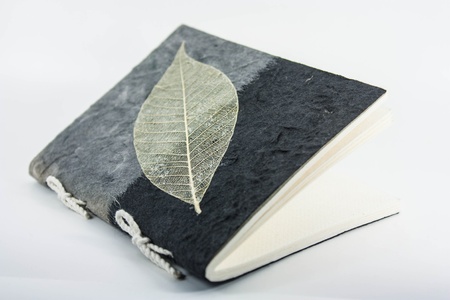 notebook takes notes to do by oneself on back white groundの写真素材