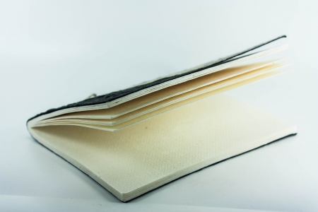notebook takes notes to do by oneself on back white groundの写真素材