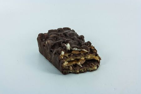 Two brownies, stacked, isolated on white with soft shadow