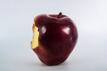 Red Apples with green leaf on whiteの写真素材