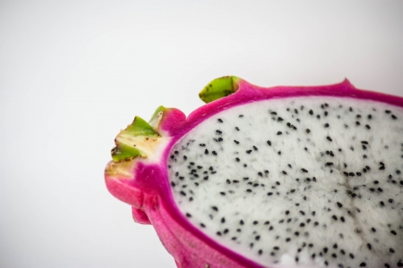 pink pitahaya isolated on a white backgroundの写真素材