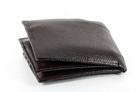 Canvas money bag on top of loose bills