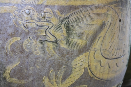 glazed water jar with dragon patternsの写真素材