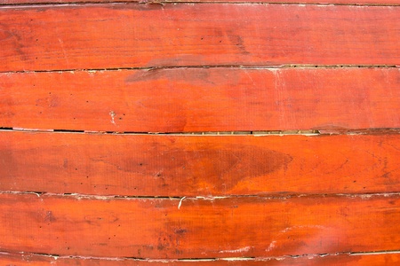 old boat laying near a big lighthouseの写真素材