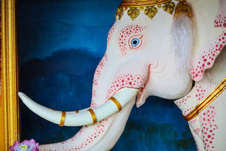 elephant on a door of a temple in Chiang Raiの写真素材