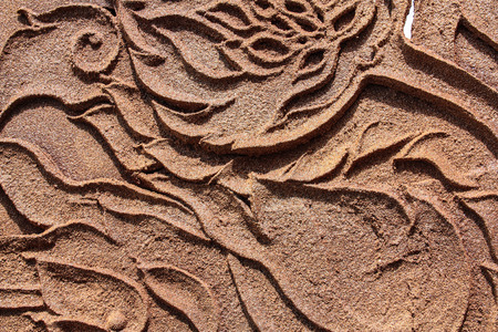 cracked clay ground into the dry seasonの写真素材