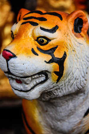 Fierce Orange Yellow Tiger Toyの写真素材