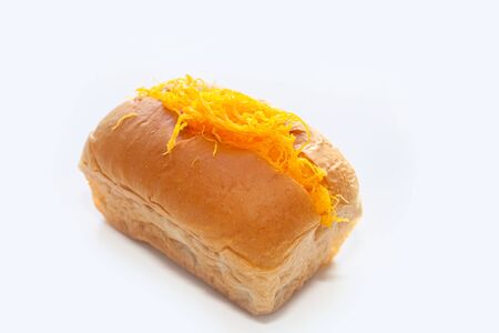 The golden bakery filling Thai dessert on a white background.の写真素材