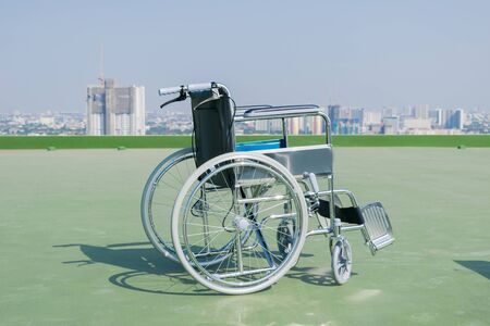 The patient sits on a wheelchair.の写真素材