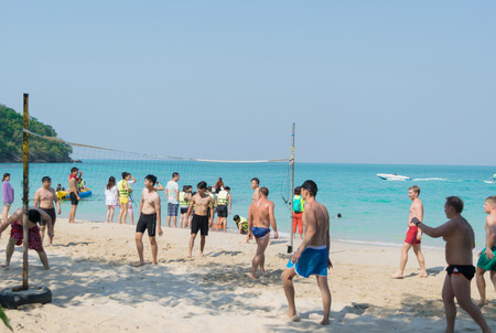 Chonburi Sai Kaew Beach people relaxing by the ocean and beach activities such as volleyball.のeditorial素材