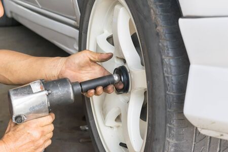 Auto mechanic Car,Removing wheels Equipment mechanicの写真素材
