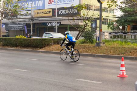 Central Nonthaburi, Thailand has hosted the cyclists along the King's Cup. There are many people who attended the event.のeditorial素材