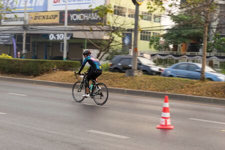 Central Nonthaburi, Thailand has hosted the cyclists along the King's Cup. There are many people who attended the event.のeditorial素材