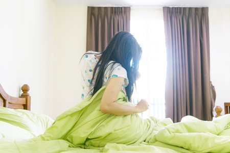 Wake up in the morning,On bed Get up from the couchの写真素材