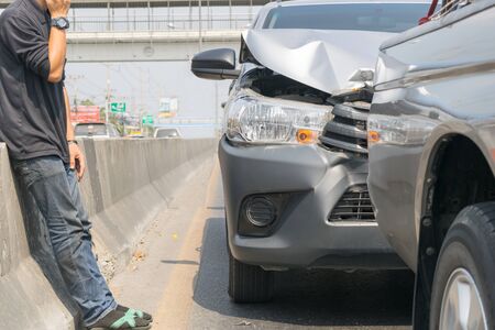 Car crash from car accident on the road in a city car pickup wait insurance White backgroundの写真素材
