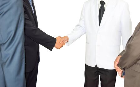 Partners shaking hands businessman shaking hands to seal a deal with his partner,clipping path selection pathの写真素材