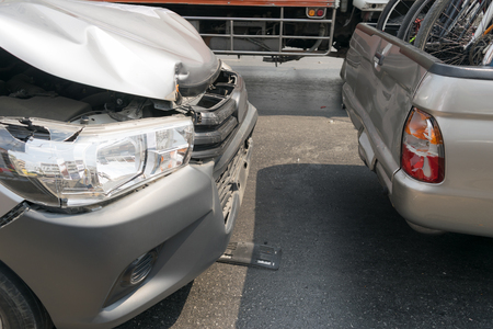 Car crash from car accident on the road in a city car pickup wait insurance.の写真素材