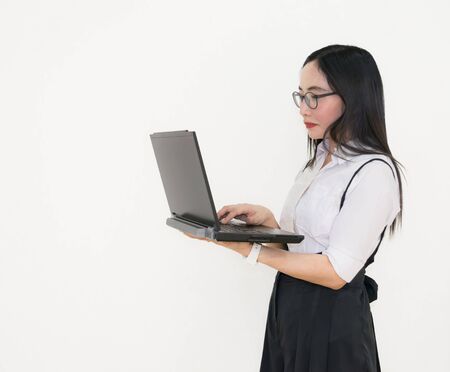 Asian young woman thinking beautiful smile put a white shirt stand of on white background.
