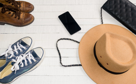 Accessories clothes fashion set jeans bags shoes hat and Smartphone buy online on a white background.の写真素材