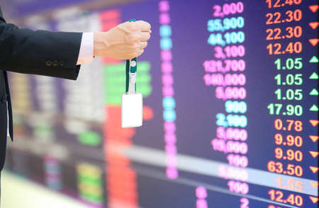 Men hold money with investments. Interest on deposits Banks and stock exchanges Background blur