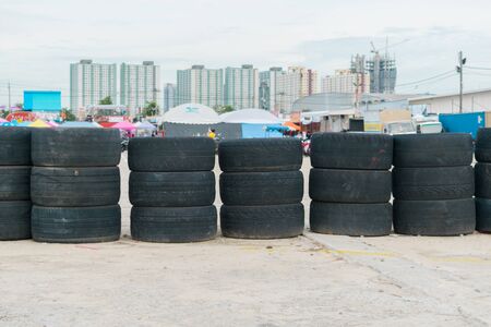 tire stacked at the parking lotの写真素材