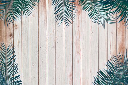 Vintage leaves on a wooden backgroundの写真素材