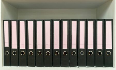 file folder papers placed on cabinet documentsの写真素材