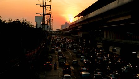 Many cars on the road trip home evening lightの写真素材