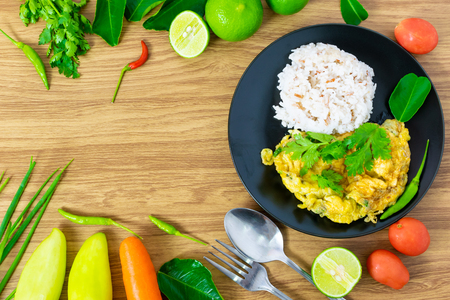 breakfast omelet egg rice food clean eating selection placed on a wooden table.の写真素材